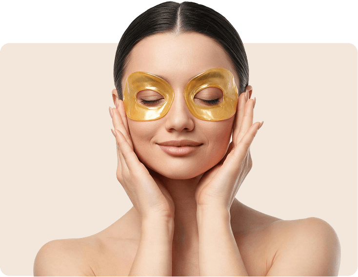 Model wearing a 24K gold eye mask