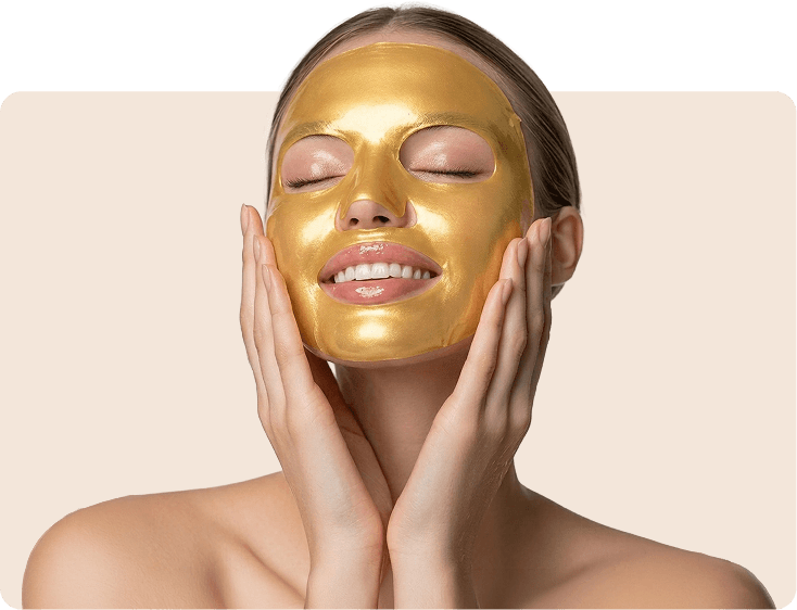 Model wearing a 24K gold sculpting mask