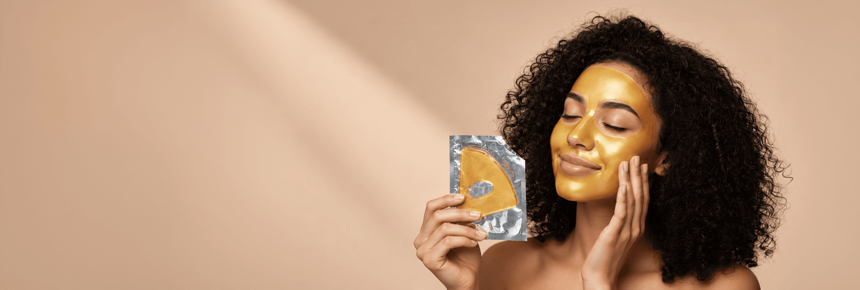 Woman enjoying 24K gold skincare masks